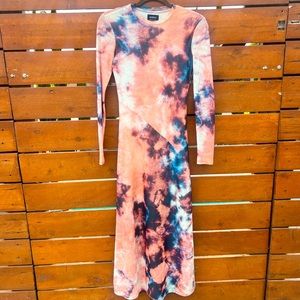 Form fitting dress worn once. In excellent condition. Small.